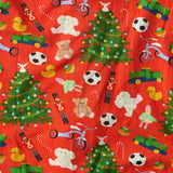 Kip & Co Christmas Toys baby romper with short sleeves, colorful festive print, soft cotton fabric, perfect for holiday wear.