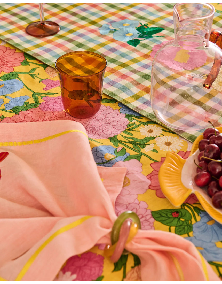 Kip & Co marshmallow and marmalade glass and carafe set with colorful patterns, displayed against a neutral background.