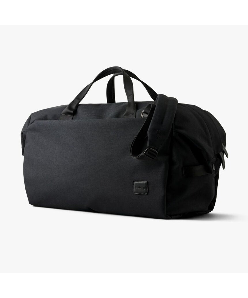 Black Bellroy Classic Duffel 35L bag with sturdy handles and spacious main compartment, suitable for travel and weekend trips.