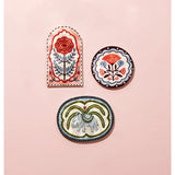 Jones & Co Samira Wall Art featuring colorful flower arch design, perfect for vibrant wall decor in living spaces.