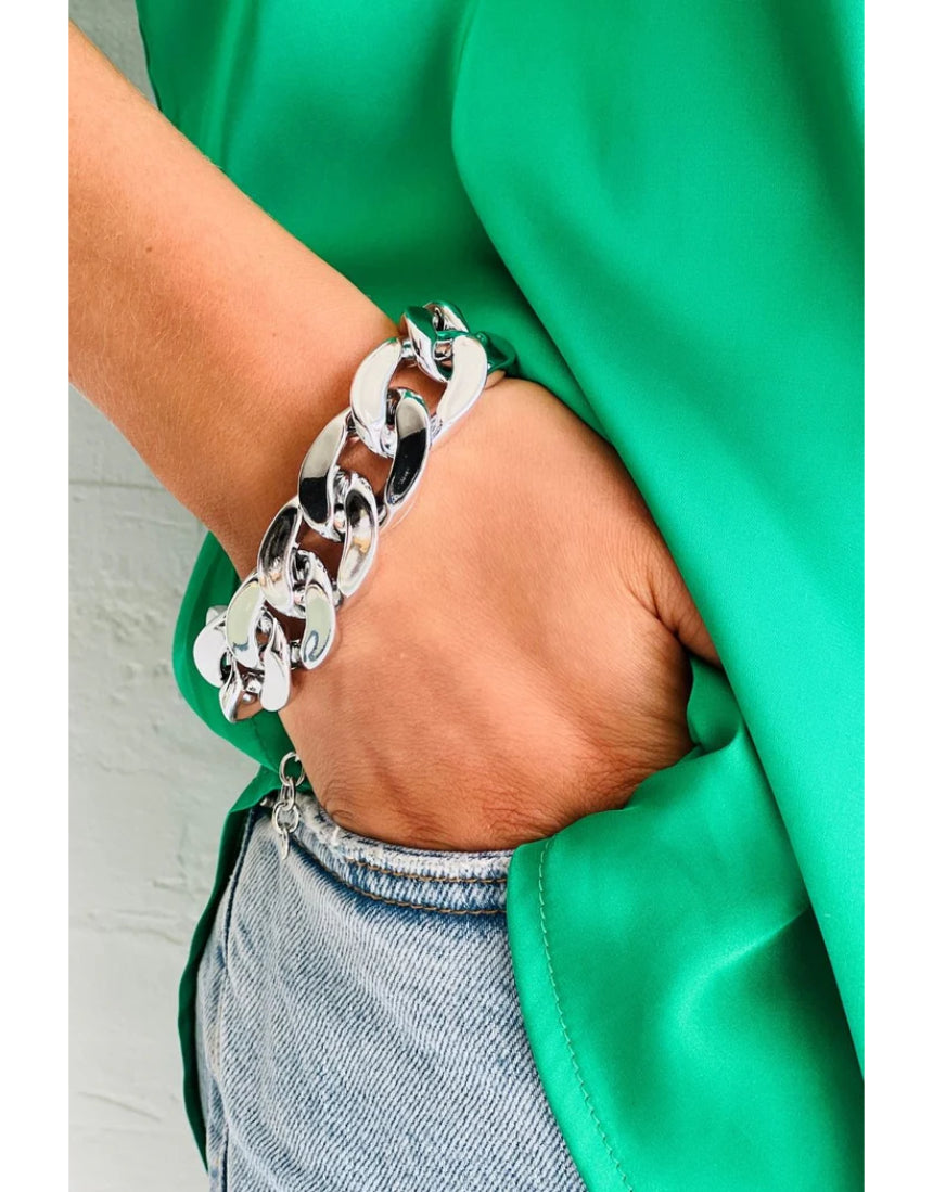 Silver bracelet from Mosk Melbourne's The Met Chai collection featuring intricate design and polished finish.