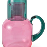 Kip & Co Isle of Pink carafe and glass set, featuring a vibrant pink design with a sleek glass carafe and matching drinking glass.