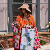 Kip & Co Hydrangea Blue Garden Kneeling Mat with floral pattern, cushioned surface for gardening comfort and support.