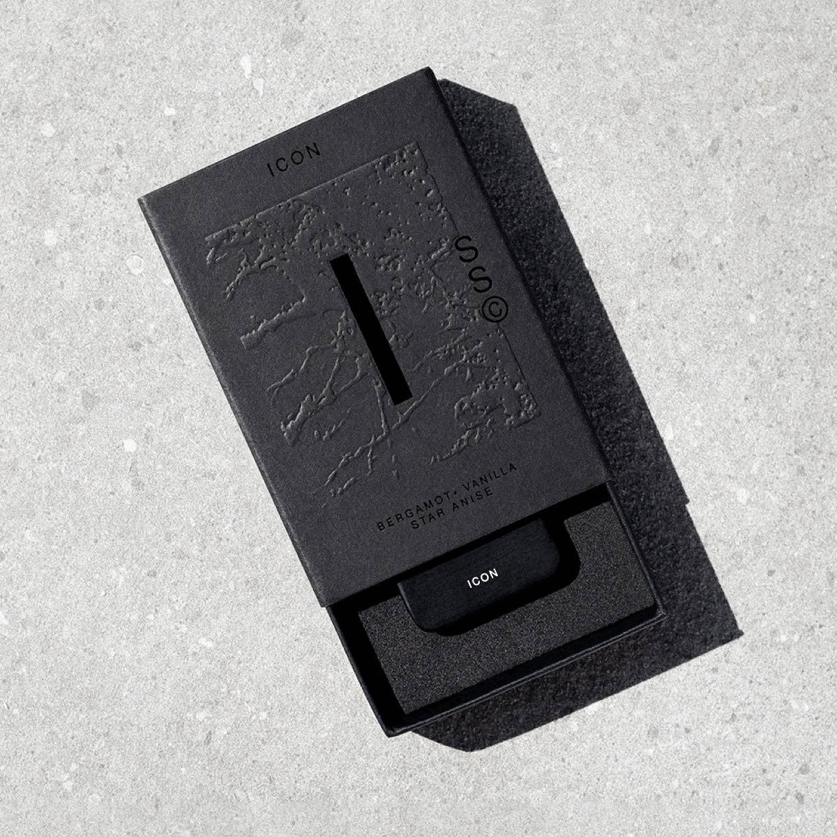Icon Solid Cologne by Solid State in a sleek container, showcasing the compact solid fragrance designed for on-the-go scent.