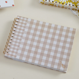 Designworks Ink meal planner and market list with a classic gingham design, featuring organized sections for meal planning and grocery lists.