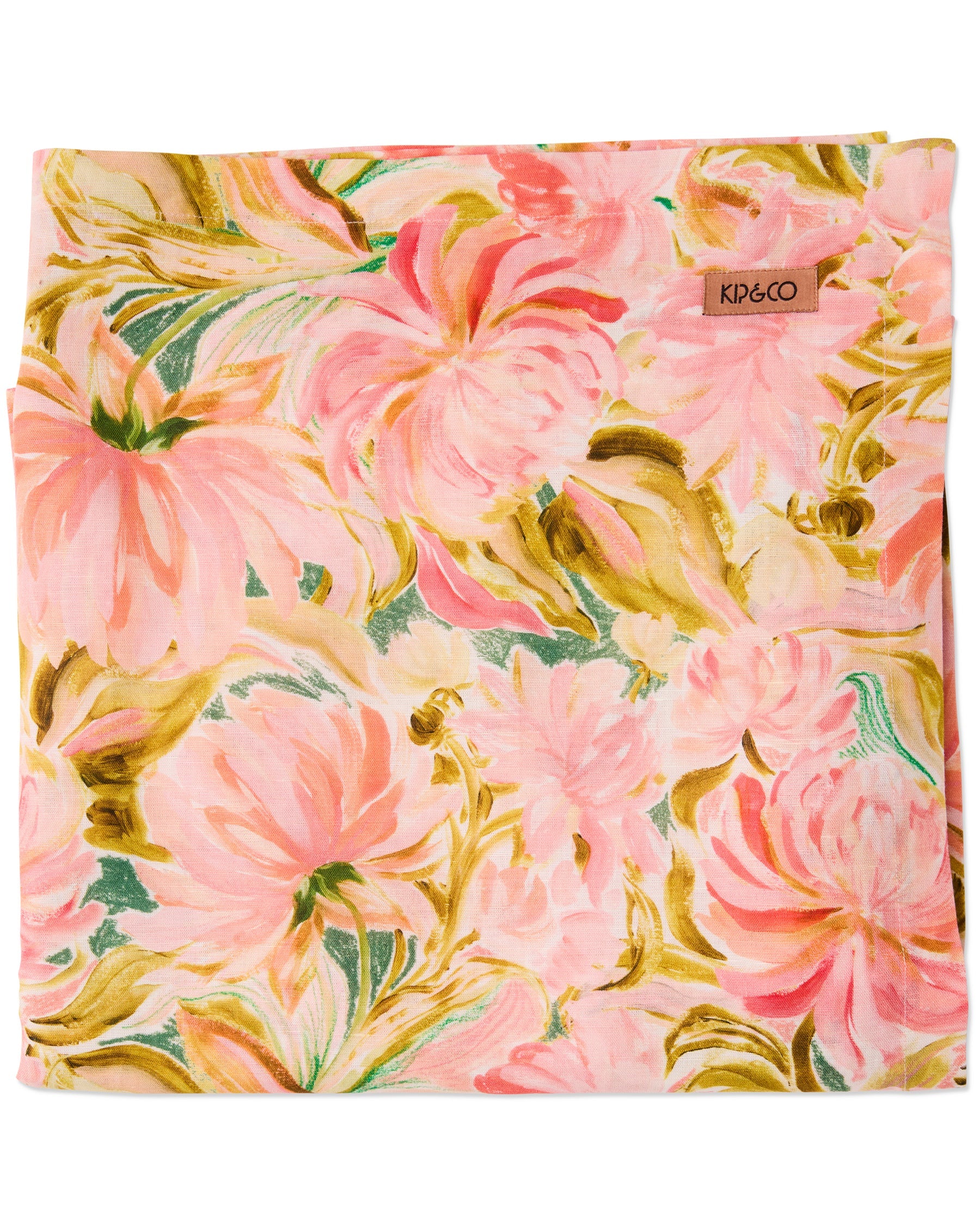 Kip & Co warm floral breeze tablecloth with vibrant floral pattern, made of soft fabric, shown spread on a table.