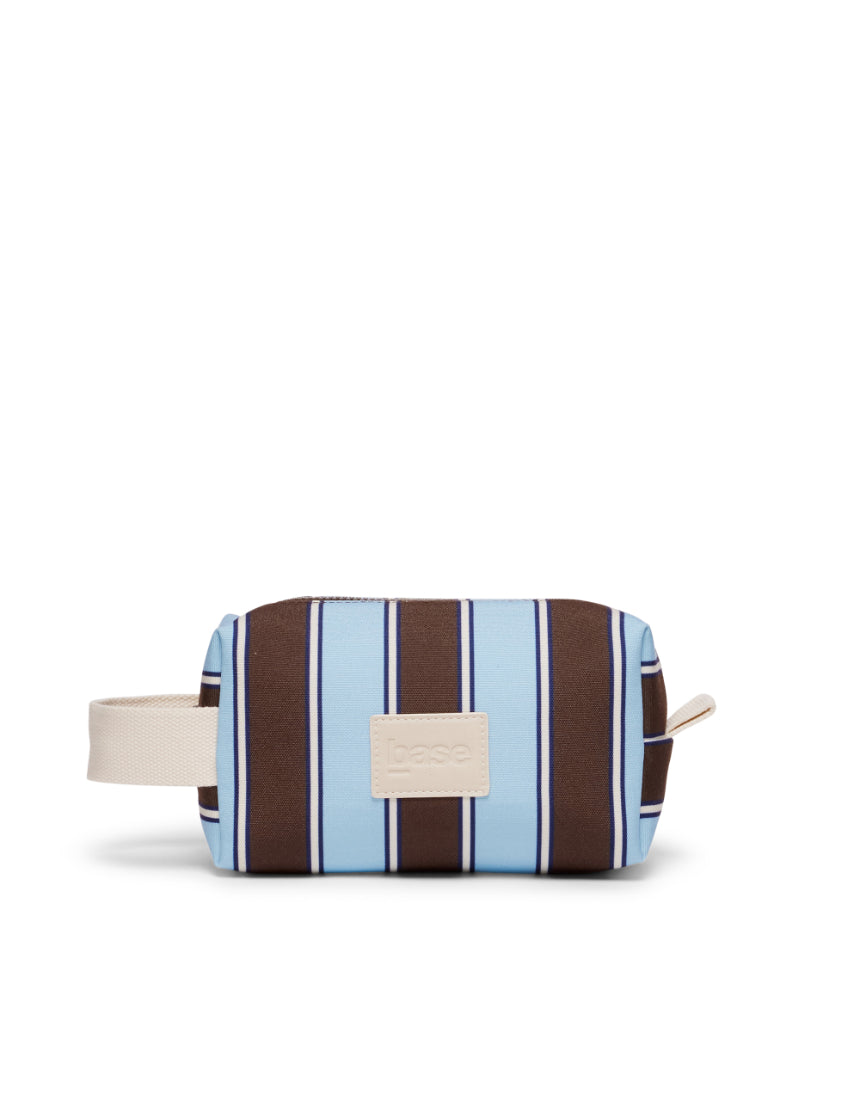 Base Ditty Base in chocolate stripe fabric, showcasing its textured pattern and stylish design.