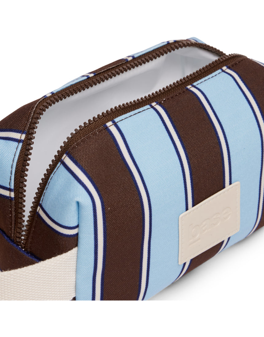 Base Ditty Base in chocolate stripe fabric, featuring a sleek, modern design with contrasting stripe pattern.