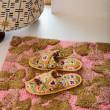 Kip & Co Bloom bath mat with colorful floral pattern, soft textured surface, and non-slip backing for bathroom decor and safety