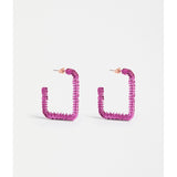 ELK The Label Hiva large hoop earrings in vibrant fuchsia, featuring bold circular design and smooth finish.