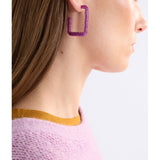 Fuchsia large hoop earrings from ELK The Label's Hiva collection, featuring bold, round design with a vibrant color.