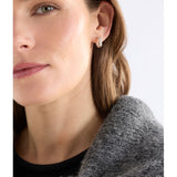 Silver Elk Hiva Mini Hoop Earring from ELK The Label, featuring a sleek, minimalist hoop design on a plain background.