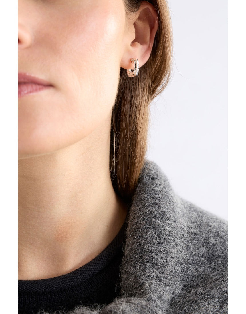 Silver Elk Hiva Mini Hoop Earring by ELK The Label showing a small, sleek hoop earring with a polished finish.