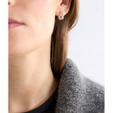 Silver Elk Hiva Mini Hoop Earring by ELK The Label showing a small, sleek hoop earring with a polished finish.