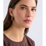 Midnight ELK The Label Jolle hoop earrings in silver with a sleek, modern design, shown close-up on a plain background.