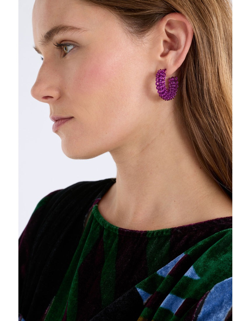 Fuchsia Elk Klippan Hoop Earring by ELK The Label, showcasing a vibrant, circular hoop design with a modern style.