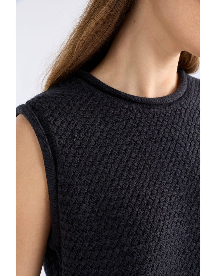 Black Elk Naya Knit Vest from ELK The Label, showcasing a cozy, textured knitwear design on a model.