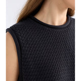 Black Elk Naya Knit Vest from ELK The Label, showcasing a cozy, textured knitwear design on a model.