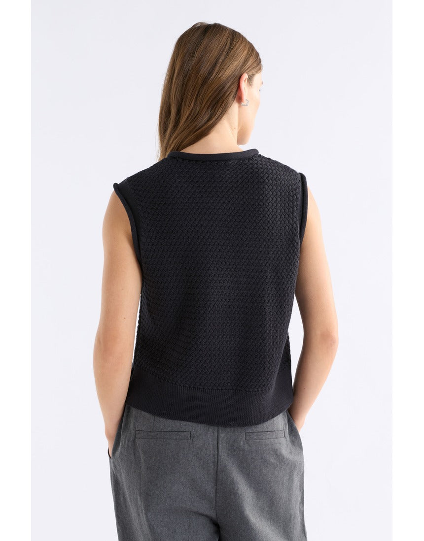 Black Elk Naya Knit Vest from ELK The Label, featuring a cozy knitwear design with a fitted silhouette.