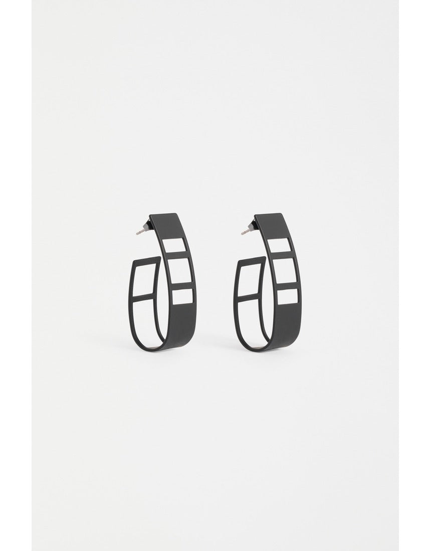 Black Elk Skeni Earring by ELK The Label featuring a sleek, modern earring design with minimalist style.