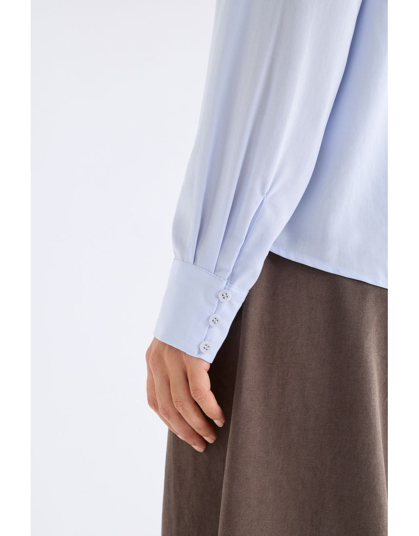 Pale blue Elk Tettu shirt by ELK The Label, showcasing a soft, casual tops design with a relaxed fit and simple neckline.