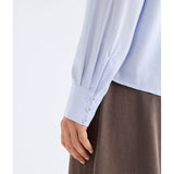 Pale blue Elk Tettu shirt by ELK The Label, showcasing a soft, casual tops design with a relaxed fit and simple neckline.