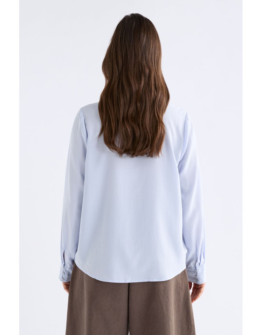 ELK The Label Tettu Shirt in pale blue, a casual top with a relaxed fit and soft fabric, perfect for everyday wear.