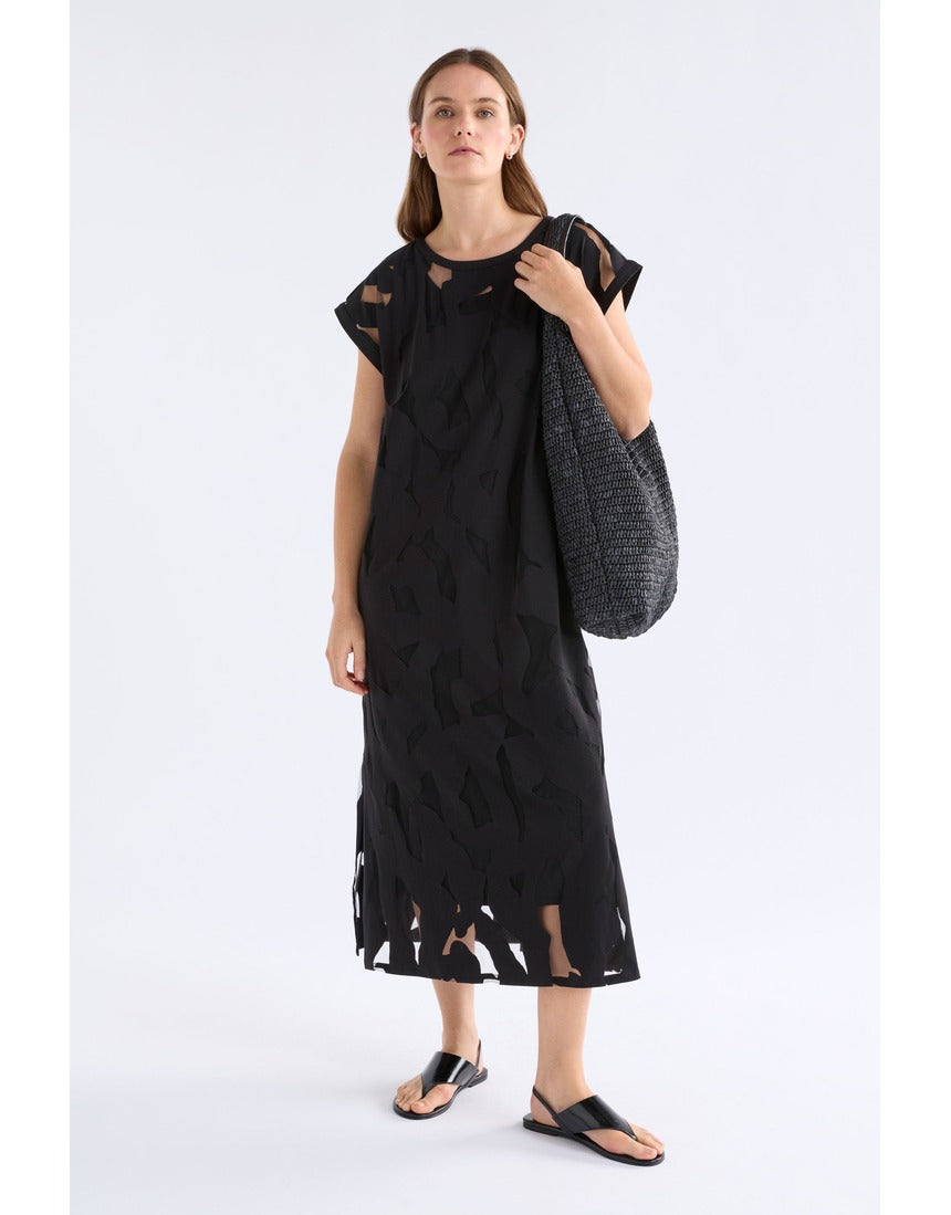 Black Elk Varr Burnout Dress by ELK The Label, showcasing its stylish dress design with a burnout fabric texture.