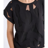 Black Elk Varr Burnout Top by ELK The Label featuring sheer burnout fabric and a relaxed, stylish fit.
