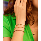 Estella Bartlett Coco & Tourmaline bracelet featuring a delicate chain with colorful gemstone accents.