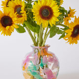 Kip & Co Swirl Sorbet round vase with vibrant, colorful swirl pattern, standing on a flat surface, decorative home decor piece