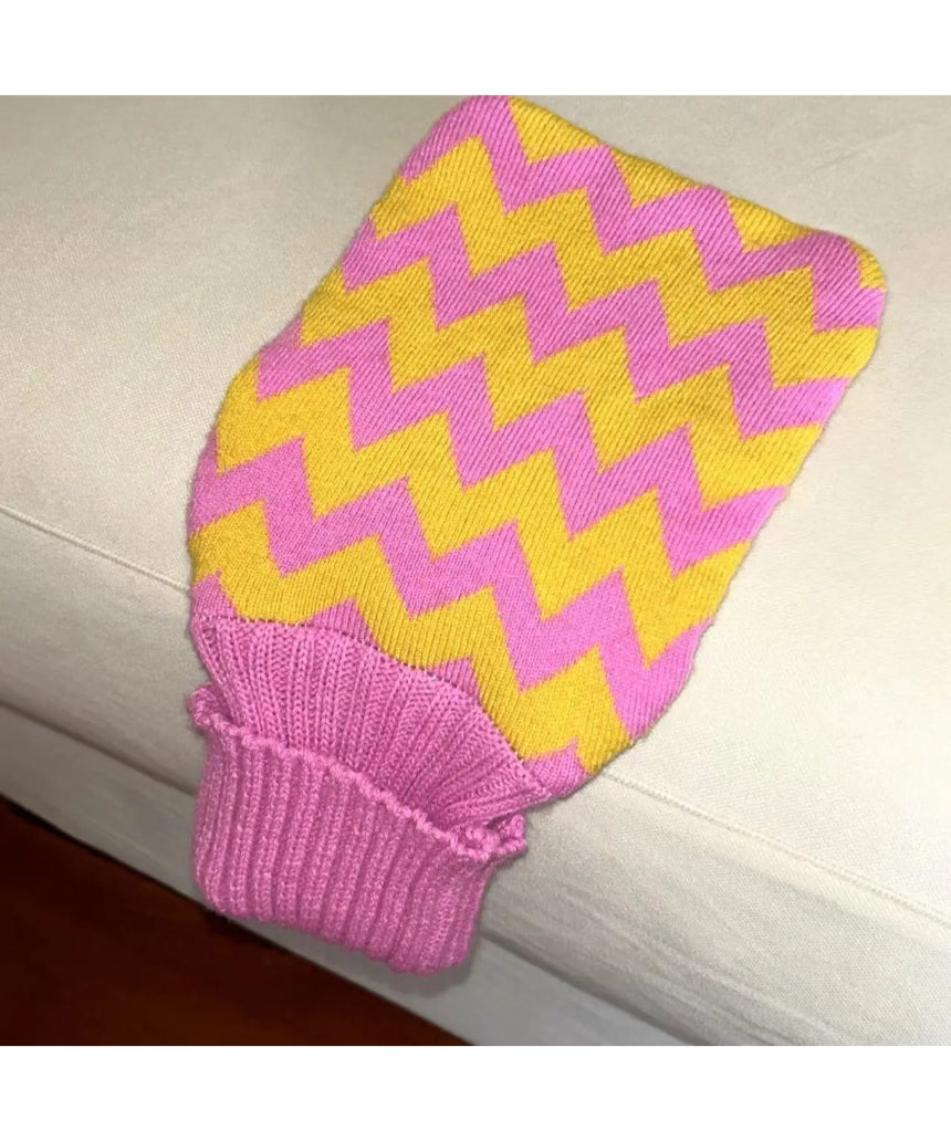 Casa Rolio hot water bottle with candy-colored cover, soft fabric exterior, and a cozy, functional design for warmth and comfort.