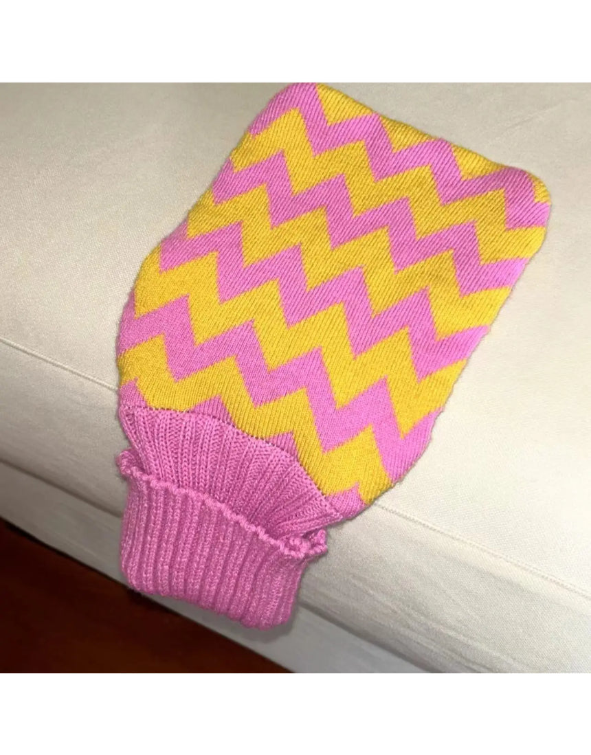 Casa Rolio hot water bottle with candy-colored cover, soft fabric exterior, and a cozy, functional design for warmth and comfort.