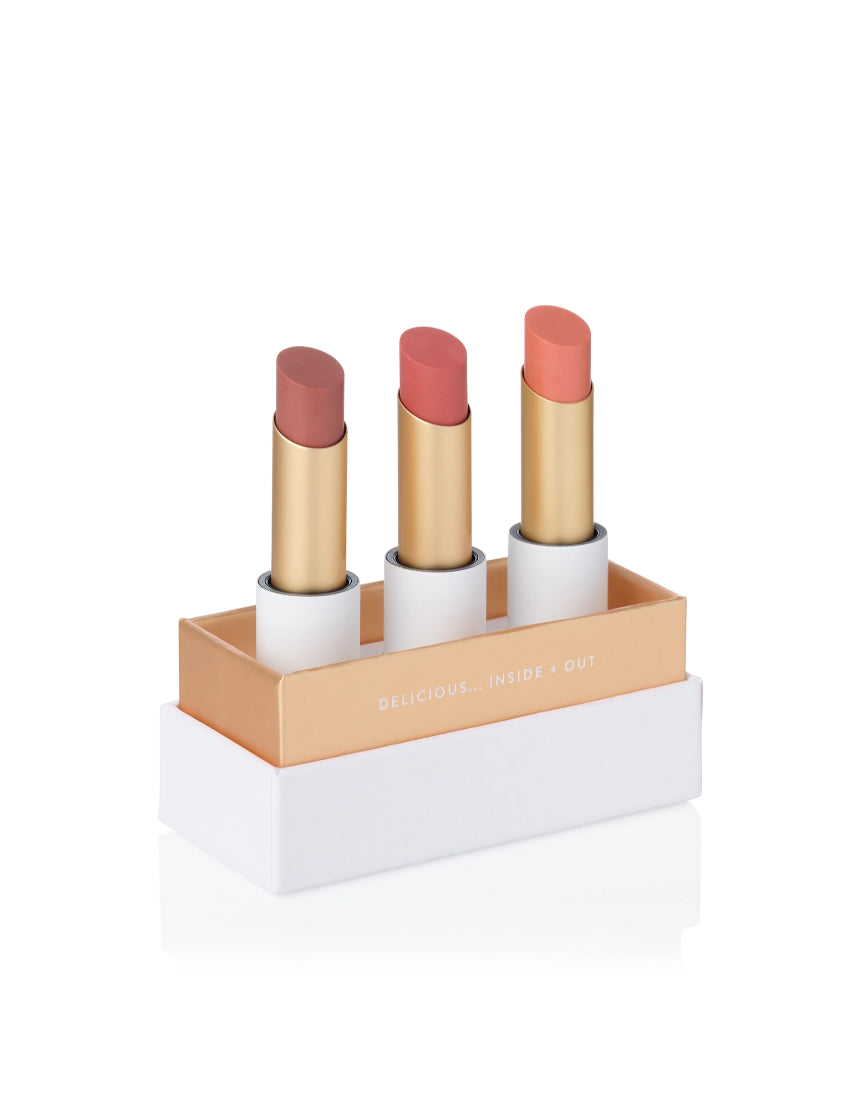 Lük Beautifood Lip Nourish Trio featuring three nude-toned lip balms in sleek packaging, perfect for natural, hydrated lips.