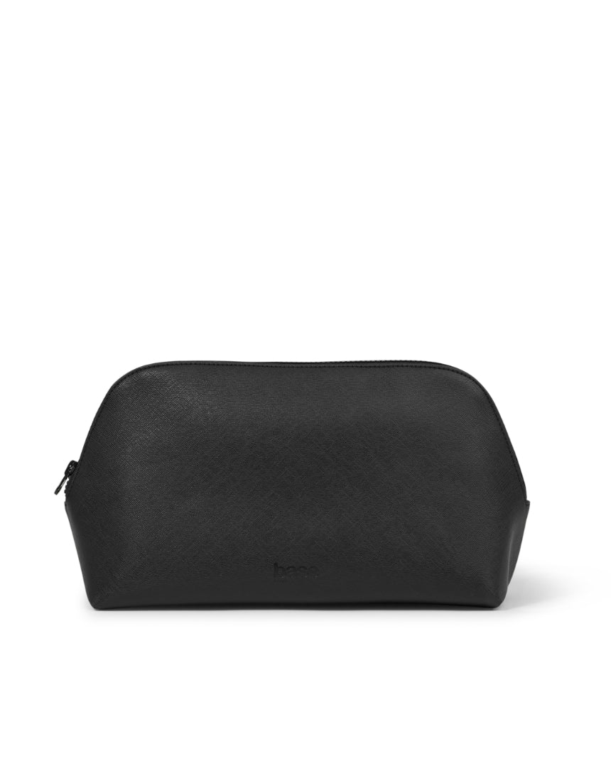 Large black cosmetic case by Base with a sturdy exterior and spacious interior for makeup and beauty essentials.