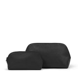 Large black cosmetic case by Base with a sleek, sturdy design and multiple compartments for organizing makeup and beauty essentials.