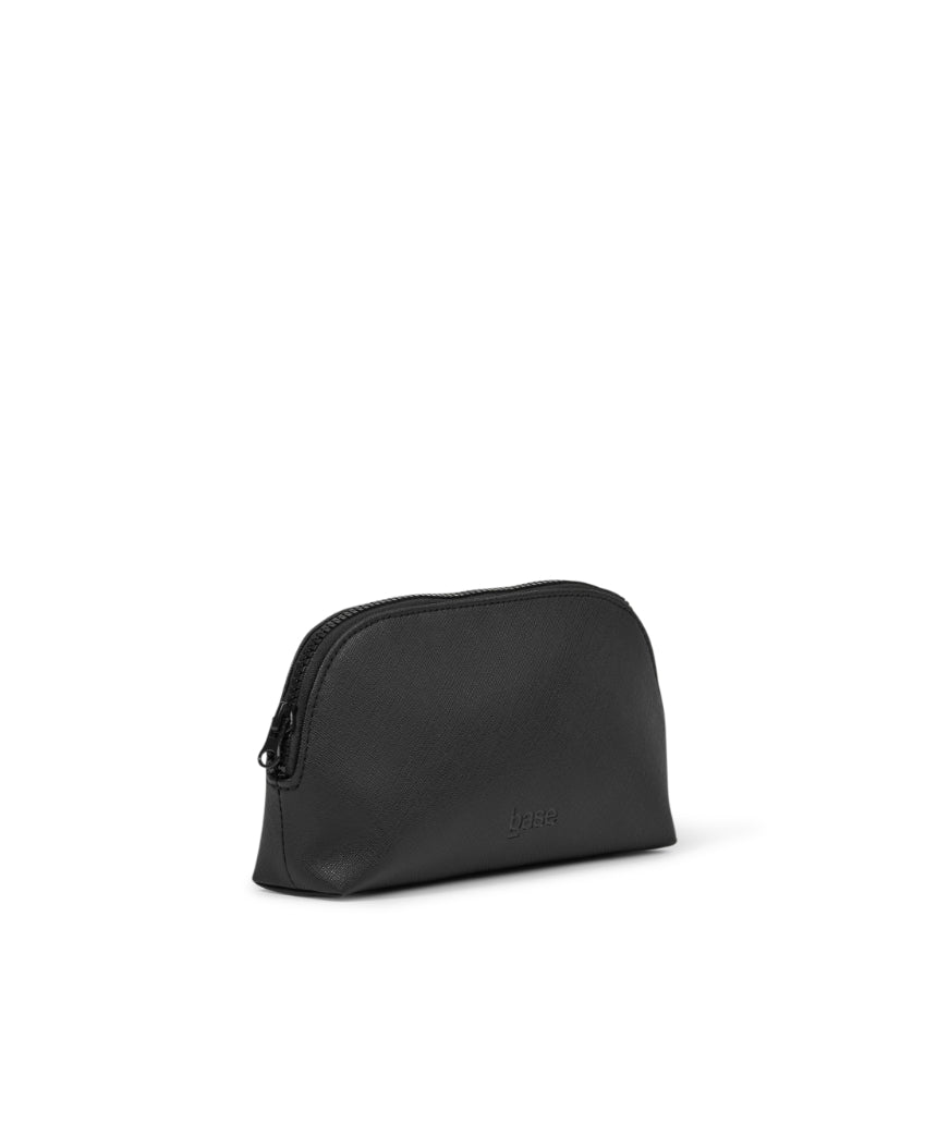 Small black cosmetic case by Base with a compact, sleek design for organizing makeup and beauty essentials.