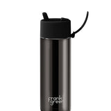 Frank Green 20oz reusable ceramic bottle with flip straw lid in Shadow Chrome, showcasing sleek design and secure lid.