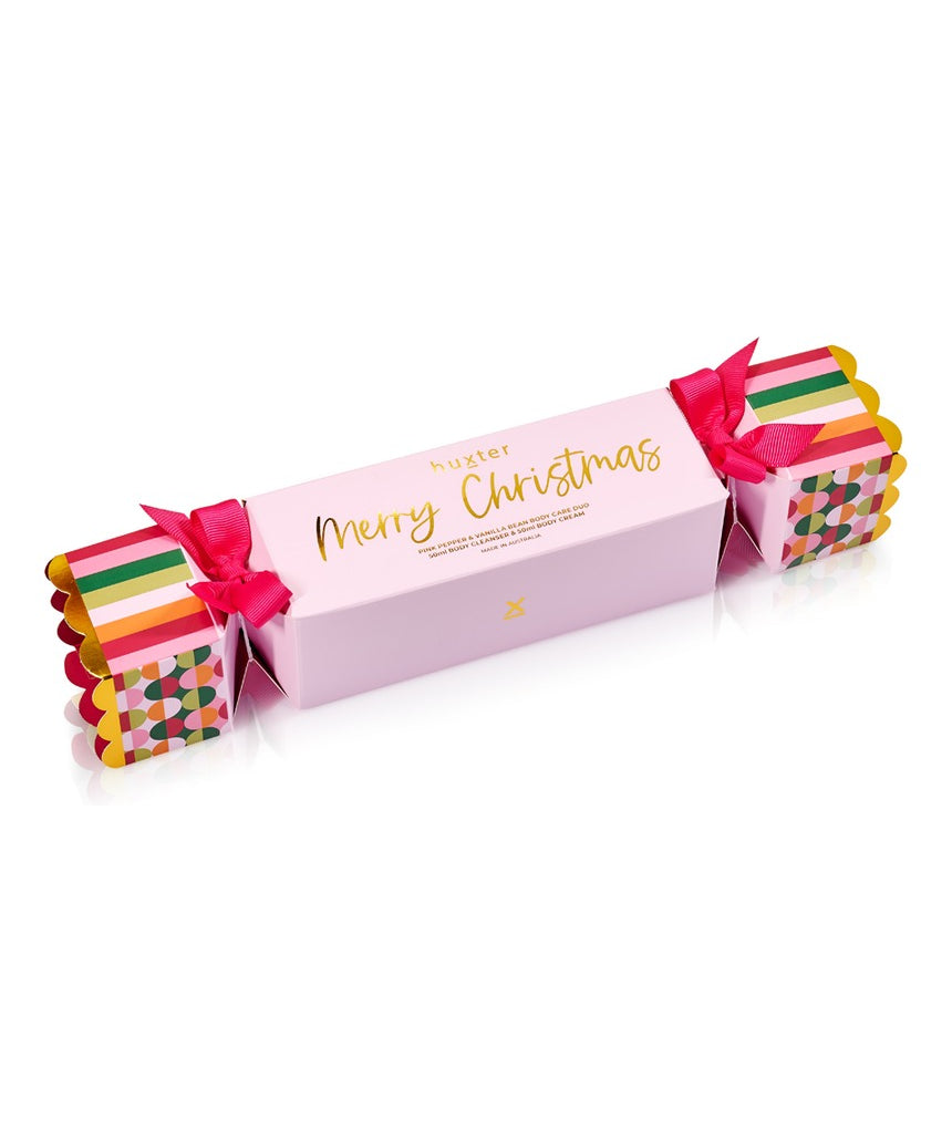 Huxter Adorned Christmas Body Care Bon Bon gift set with pink pepper and vanilla bean, featuring wrapped body care products in festive packaging.