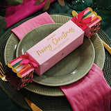 Huxter Christmas Body Care Bon Bon styled on a festive table