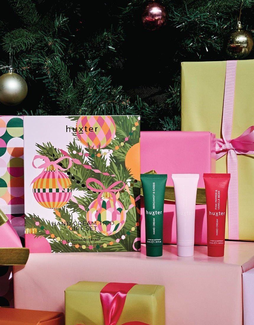 Huxter Hand Cream Trio styled with colourful Christmas gifts