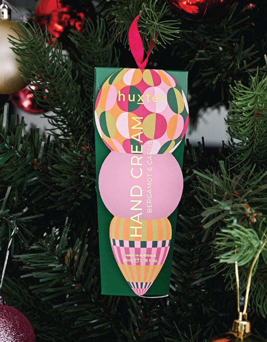 Huxter Green Hanging Hand Cream on a Christmas tree