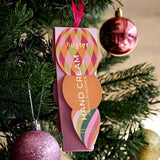 Huxter Soft Pink Hanging Hand Cream on a Christmas tree