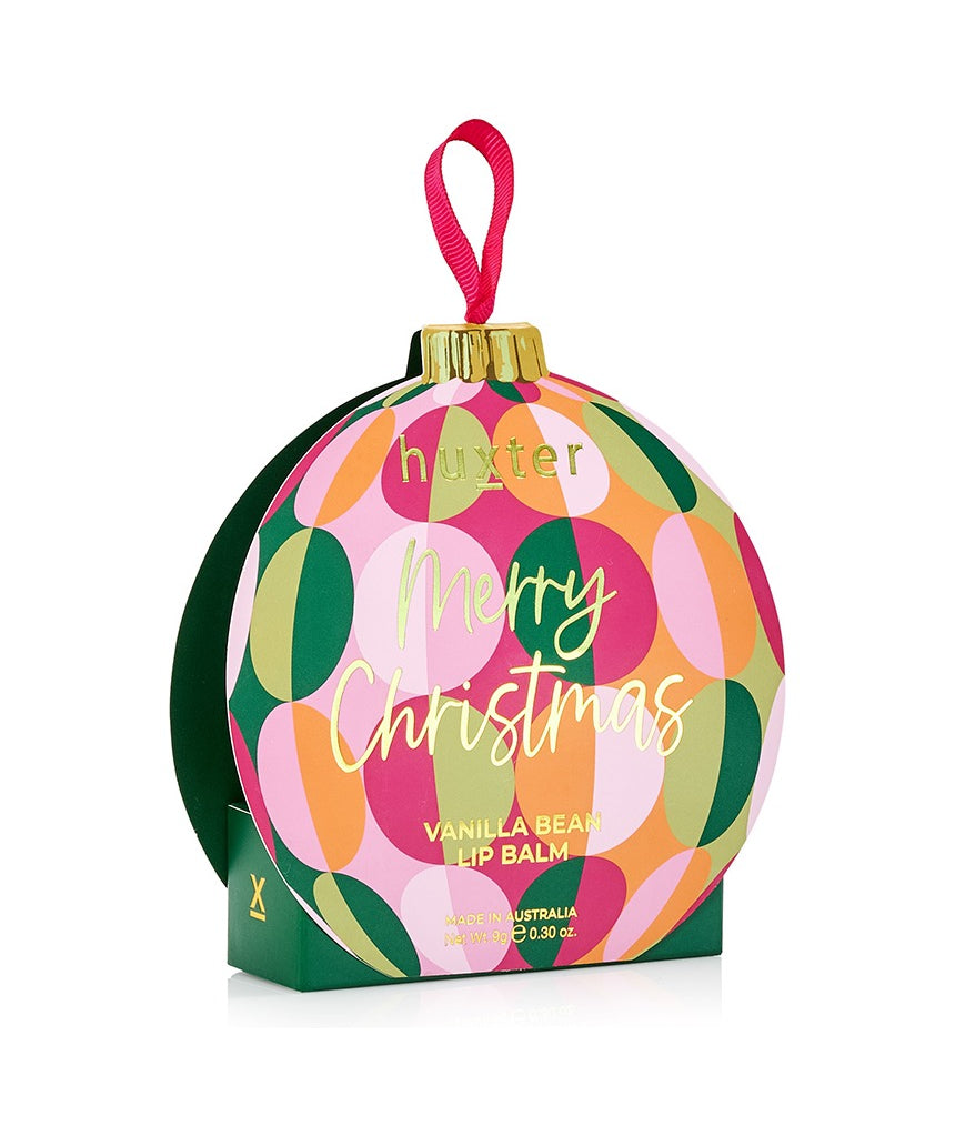 Huxter Adorned Christmas Hanging Lip Balm in green, with festive packaging and decorative Christmas design.
