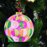 Huxter Green Hanging Lip Balm displayed on a Christmas tree