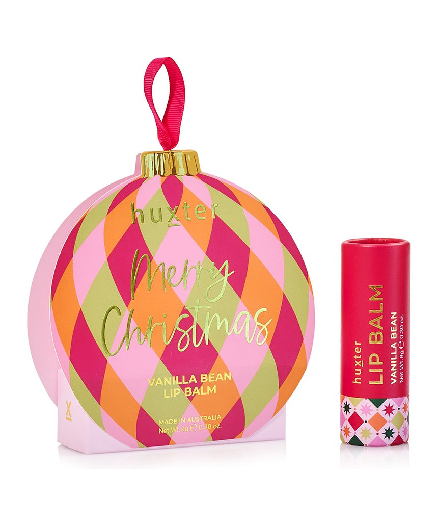 Huxter Adorned Christmas hanging Lip Balm in soft pink, featuring festive packaging and holiday-themed design.