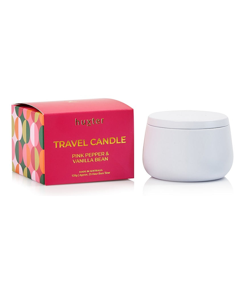 Huxter Adorned Christmas travel candle with pink pepper and vanilla bean scent, featuring festive holiday packaging.