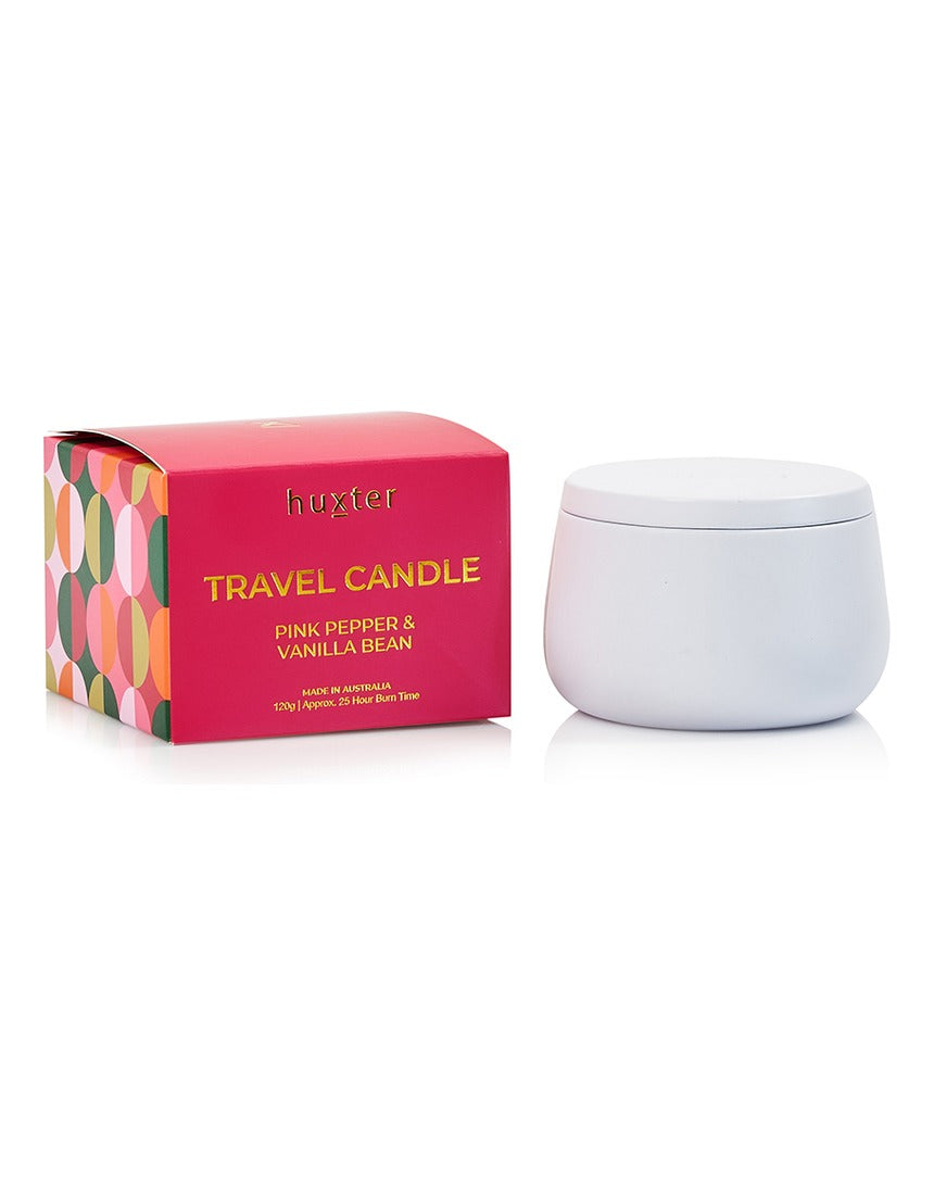Huxter Adorned Christmas travel candle with pink pepper and vanilla bean scent, featuring festive holiday packaging.