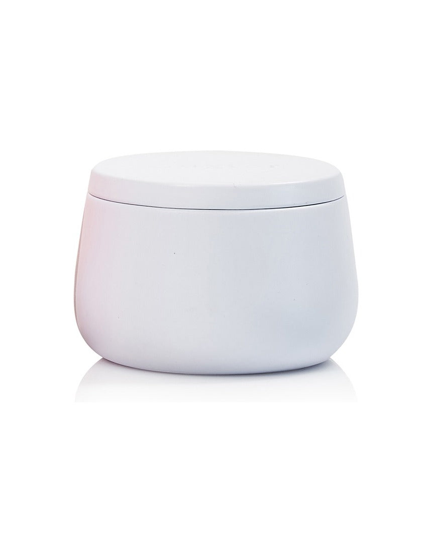Huxter Adorned Christmas travel candle with pink pepper and vanilla bean scent, featuring a festive holiday design.