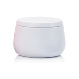 Huxter Adorned Christmas travel candle with pink pepper and vanilla bean scent, featuring a festive holiday design.